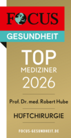 Focus Top Mediziner Siegel 2026 Hüftchirurgie Prof. Dr. med. Robert Hube, goldfarbenes Siegel mit schwarzer und weißer Schrift